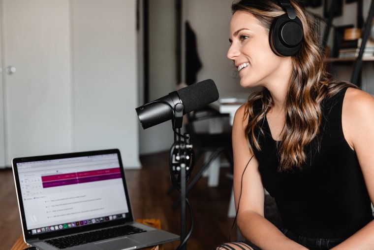 Photograph of a female podcaster